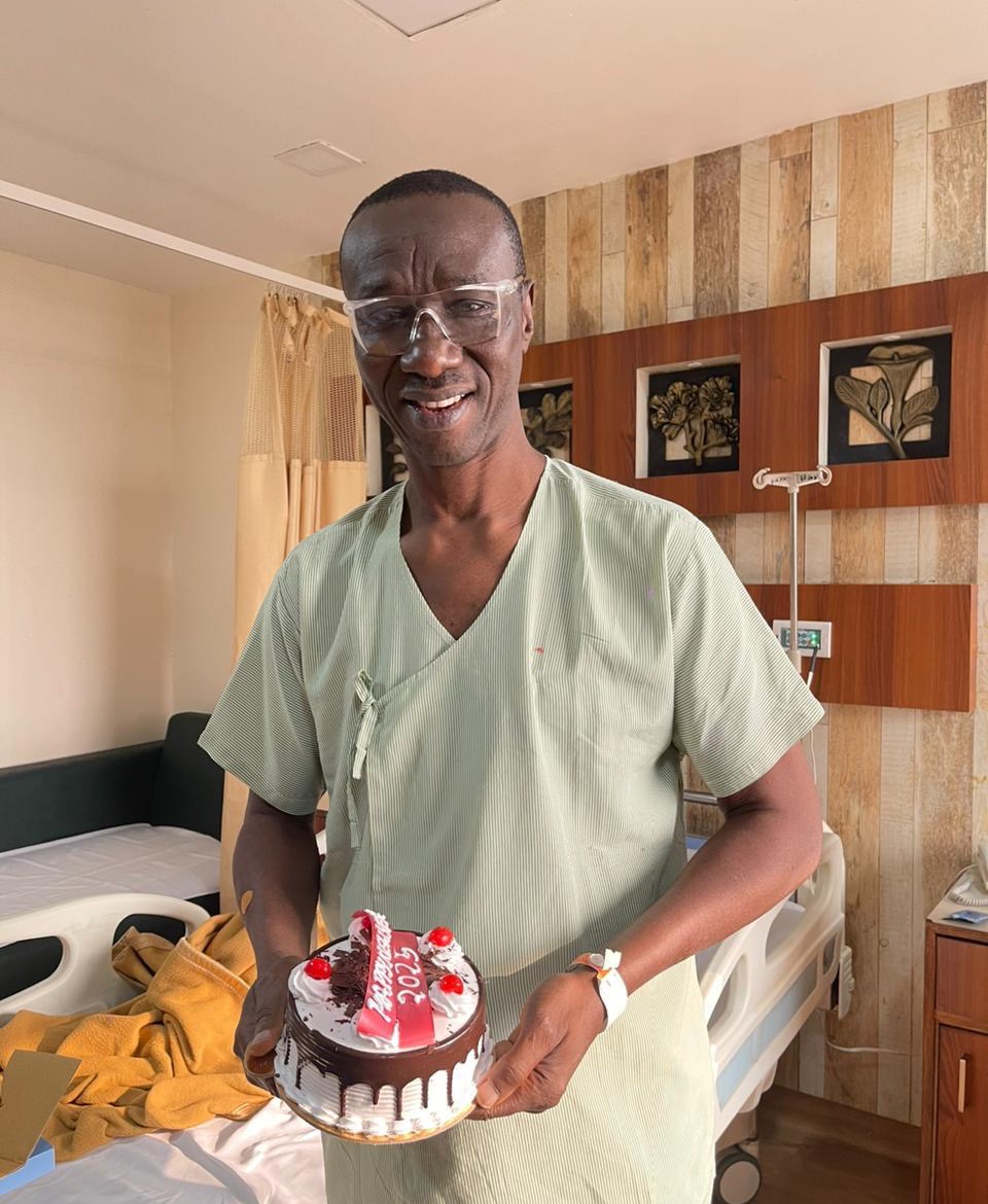 Recovered patient celebrating in hospital room