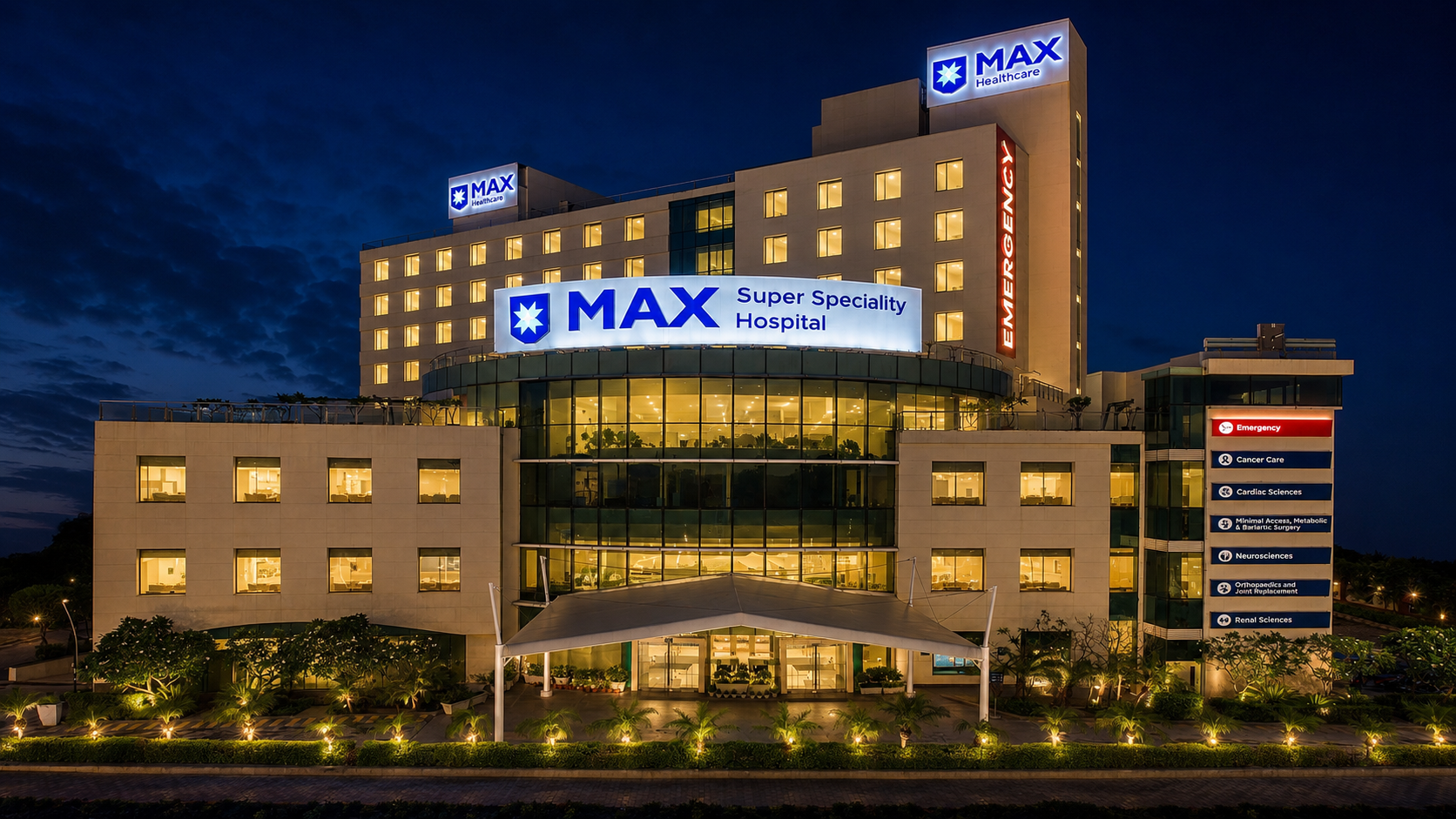 Max Healthcare hospital building illuminated at night